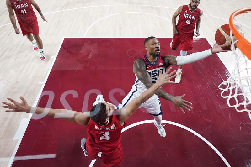 US bounces back from Olympic-opening loss, routs Iran 120-66