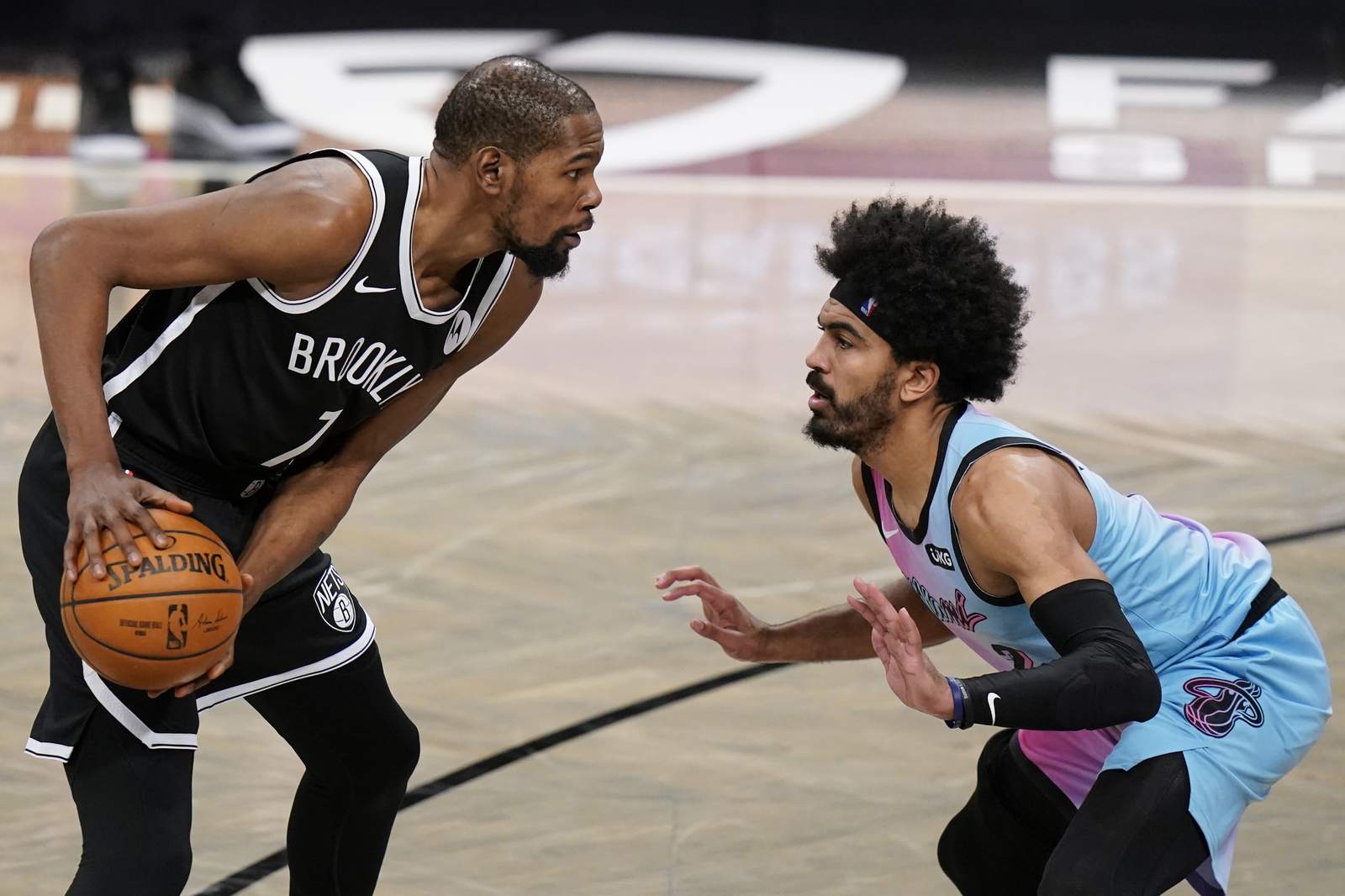 Durant, Irving help Nets hold off Adebayo, Heat 128-124
