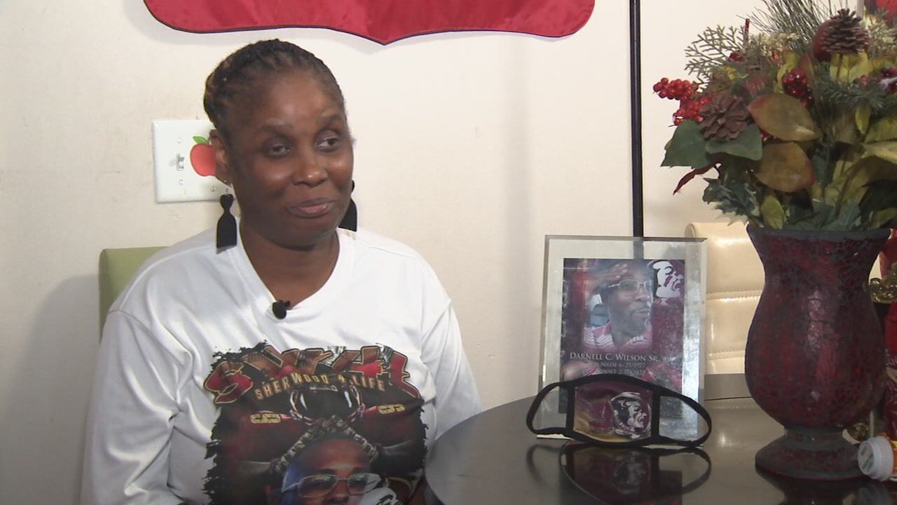 Melanese Wilson is by no means a Seminoles fan, but she surrounded herself with garnet and gold in memory of her brother.