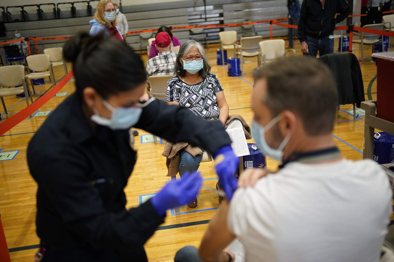The Latest: Nevada to open vaccination to everyone over 16