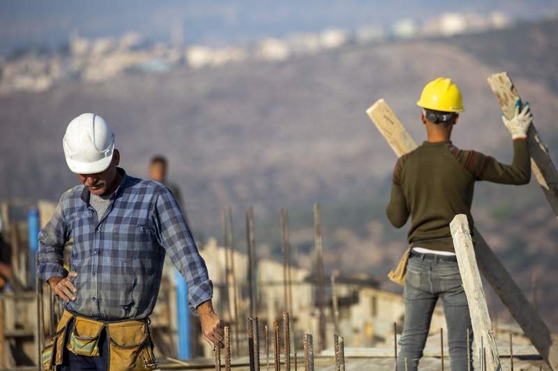 Israeli settlement plans anger some in governing coalition