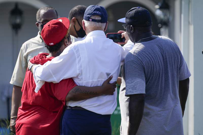 Biden walks storm-ravaged Louisiana: 'I know you're hurting'