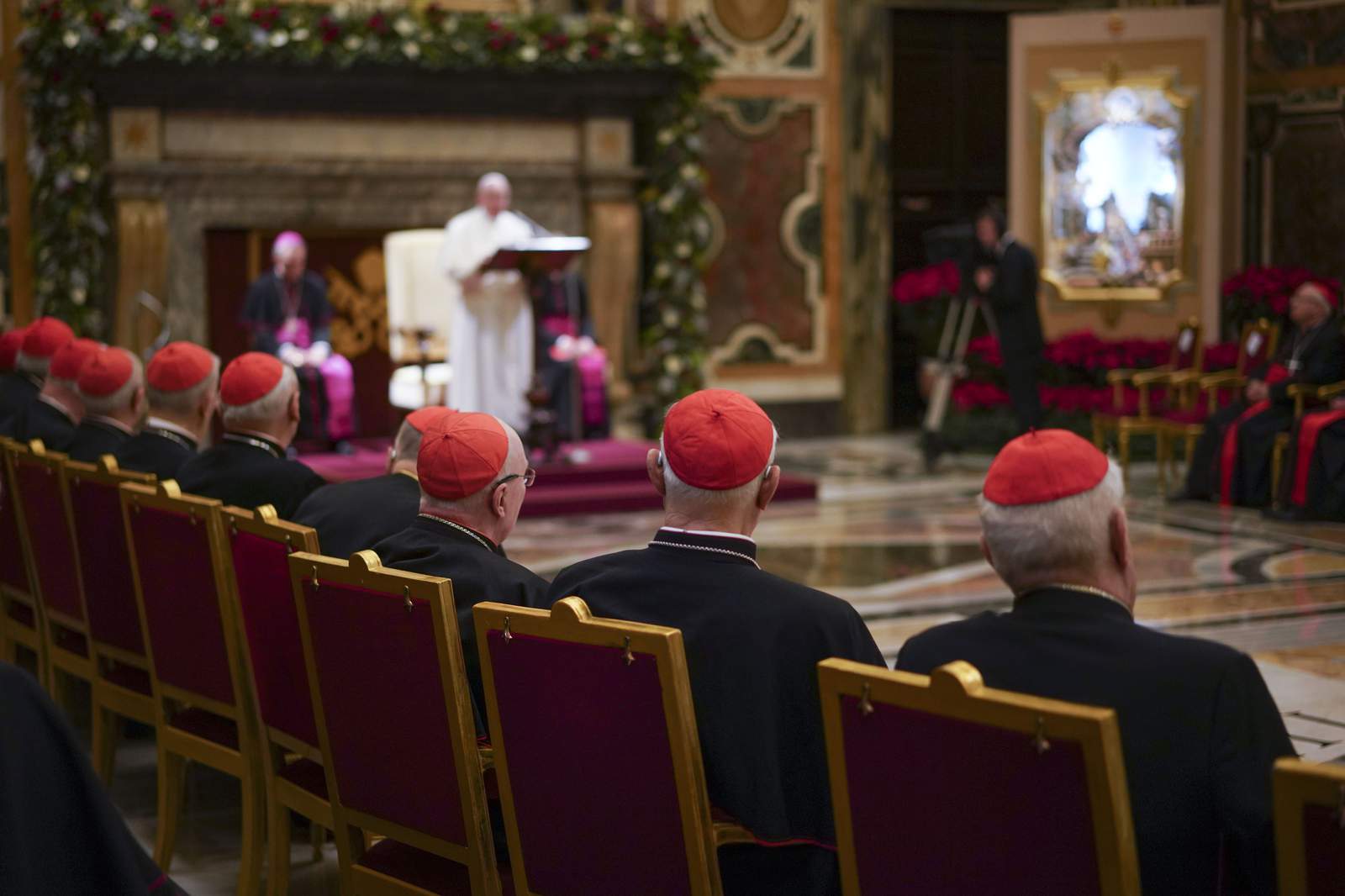 Pope, citing pandemic effect, cuts pay for cardinals, others