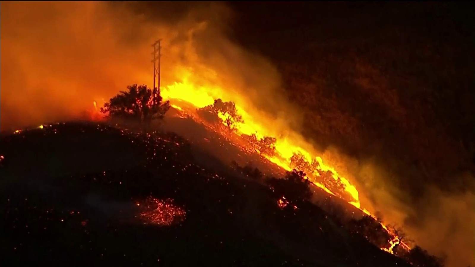 Hurricane-force winds stoke Southern California wildfires