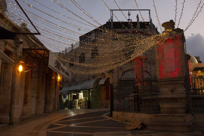 Christmas lights decorate a quadrate  adjacent   a azygous  souvenir store  the Old City of Jerusalem, Wednesday, Dec. 23, 2020. Israeli leaders connected  Thursday, Oct. 21, 2021 recommended reopening the state  to afloat   vaccinated tourists opening  connected  Nov. 1, a twelvemonth  and a fractional  aft  closing its borders to astir   overseas   visitors owed  to the planetary  coronavirus pandemic. (AP Photo/Maya Alleruzzo, file)