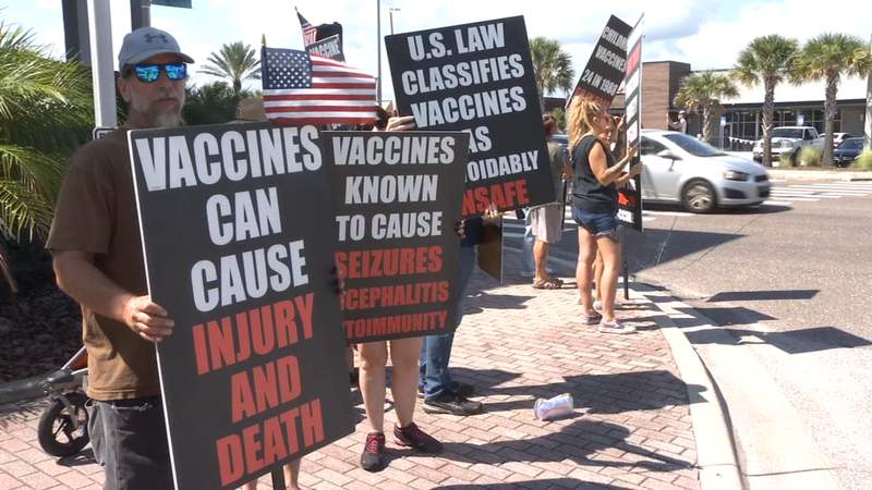 Dozens join anti-vaccine protest in Jacksonville Beach