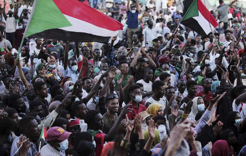 Tens of thousands protest Sudan's coup, 3 protesters killed