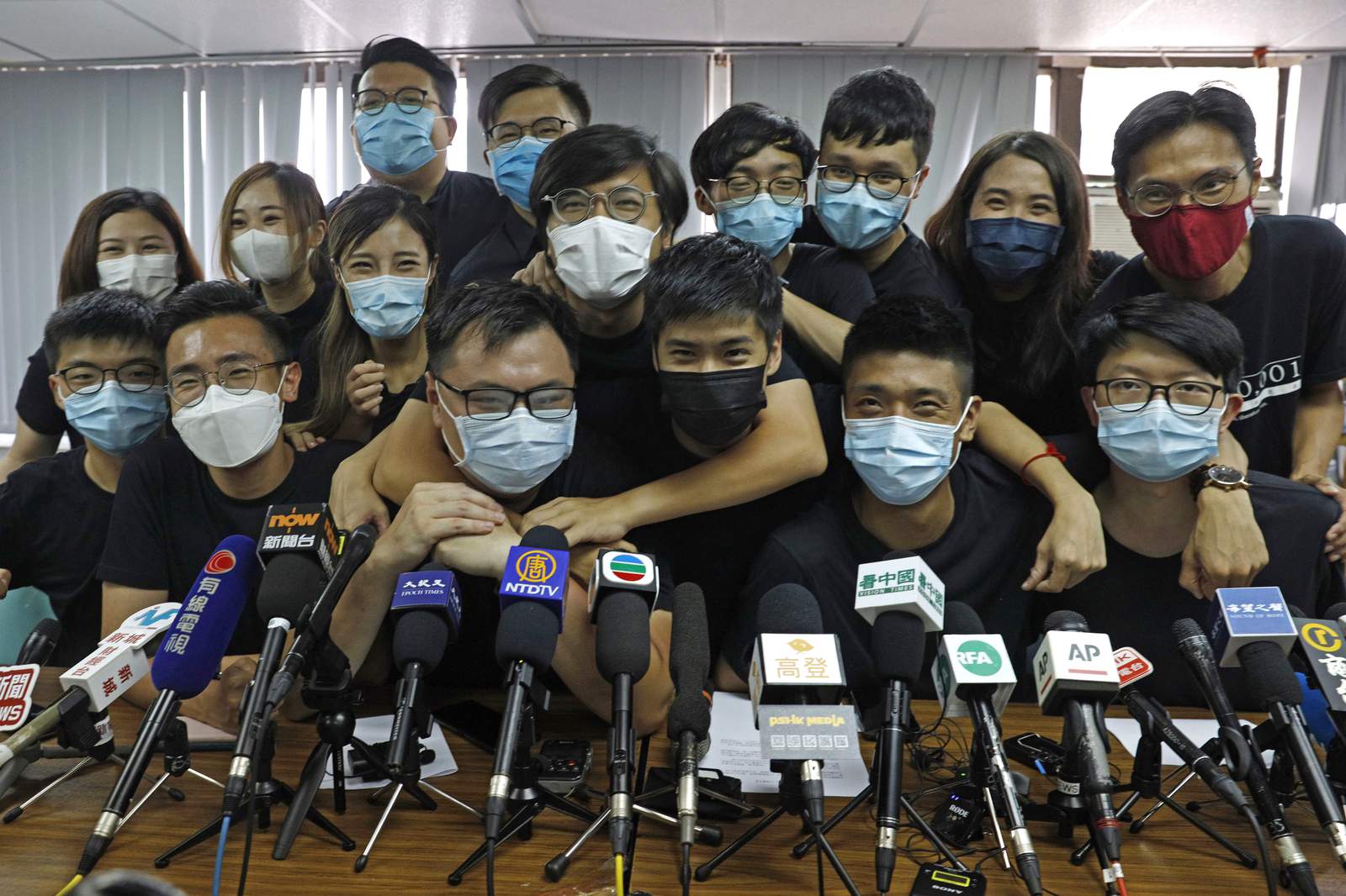 EXPLAINER: Hong Kong mass arrests chill democracy movement
