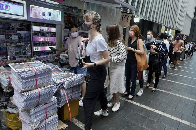 Hong Kong's last pro-democracy paper sells out final edition