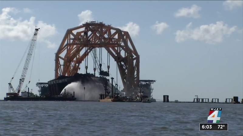 Crews monitor capsized Golden Ray after a massive fire