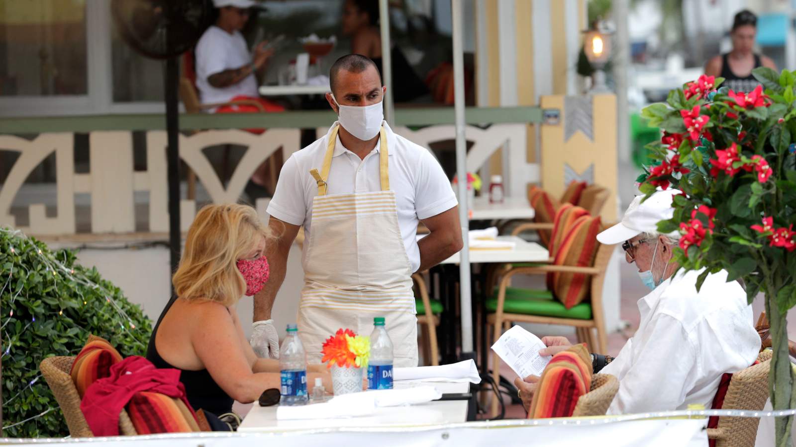 Miami-Dade County closes restaurants as virus spikes