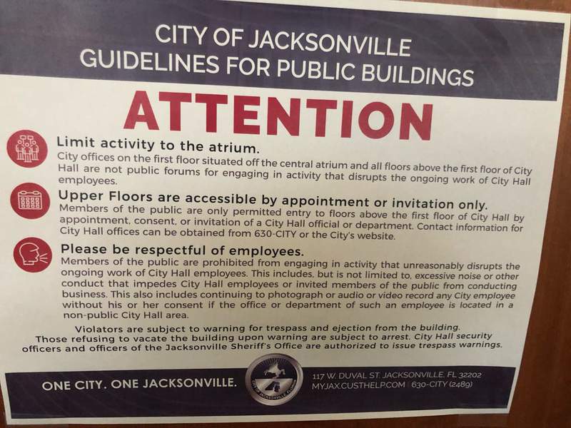 New signs in City Hall warn there’s no access without permission. Is that legal?