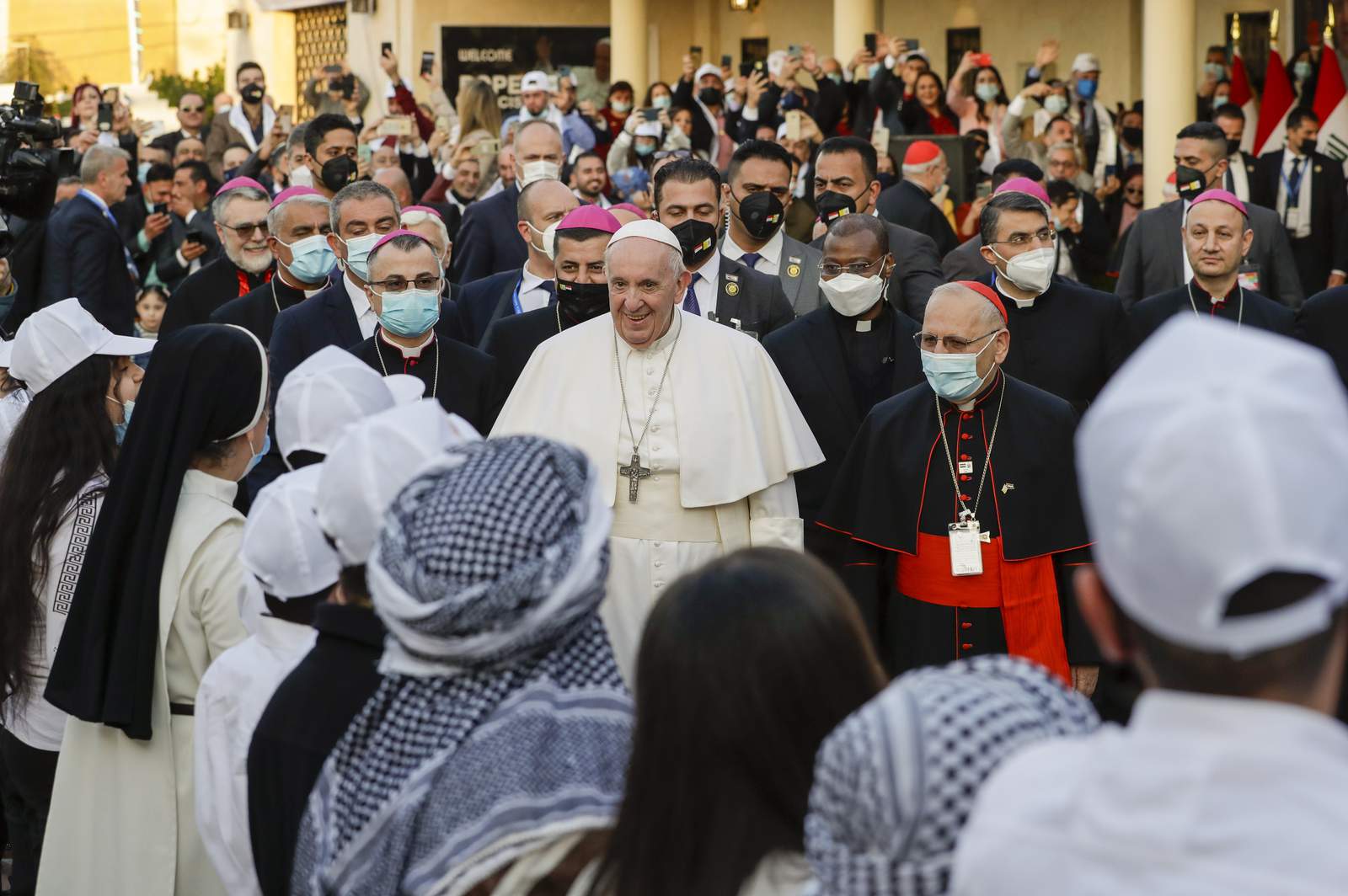The Latest: Pope Francis delivers sermon in Baghdad church