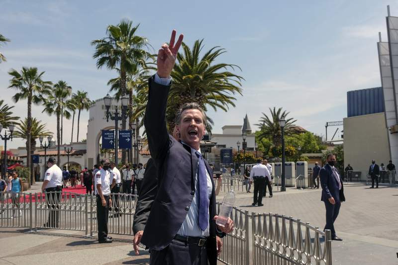 Cash payments take center stage in Newsom's 1st recall ad