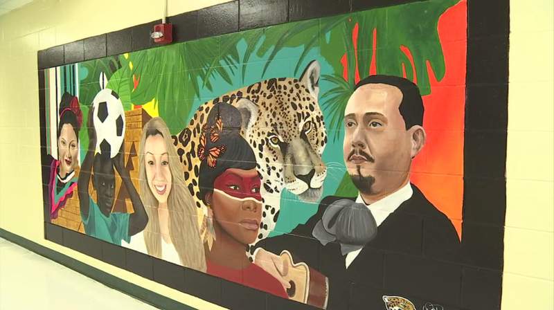 DuPont Middle School unveils mural in honor of Hispanic Heritage Month