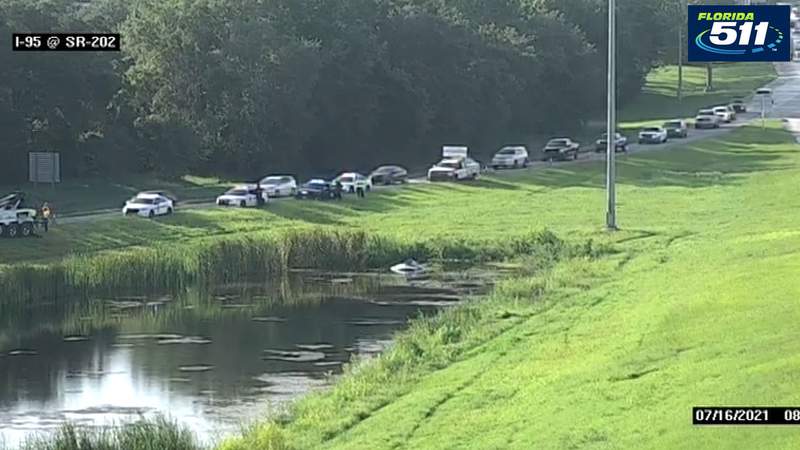 Car found submerged in pond on 95 near J. Butler Boulevard