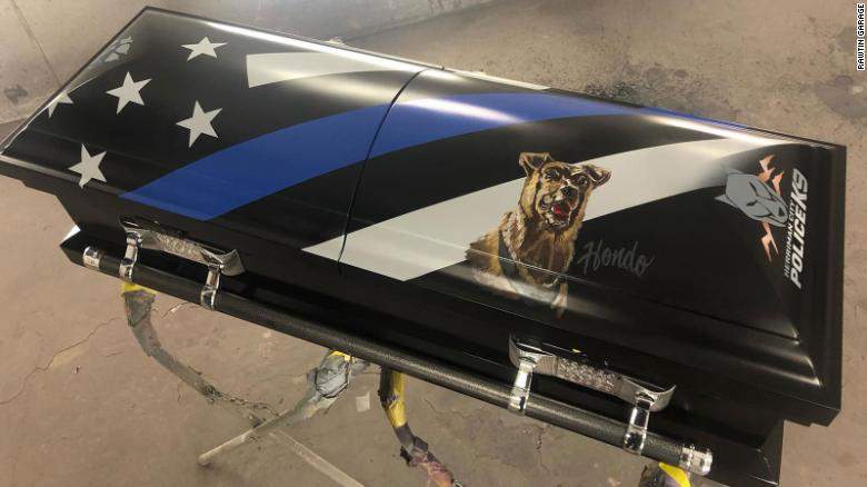 A police dog killed in the line of duty will be buried in a special casket bearing his portrait