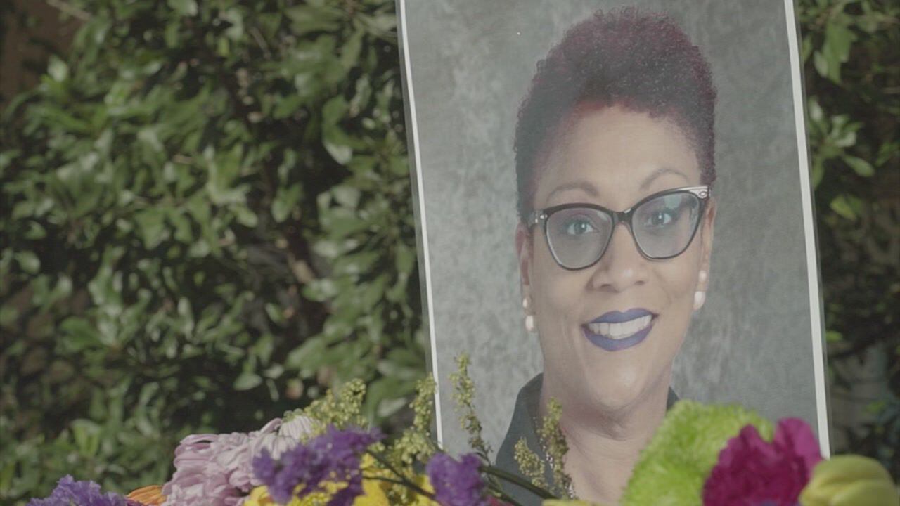 A memorial for beloved teacher Vivian James was placed in the courtyard at Atlantic Coast High School.