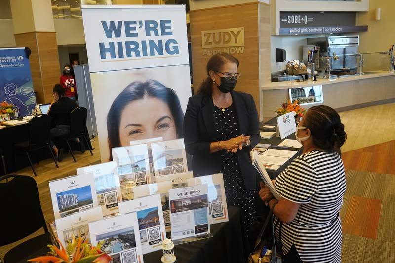 US unemployment claims rise after hitting pandemic low