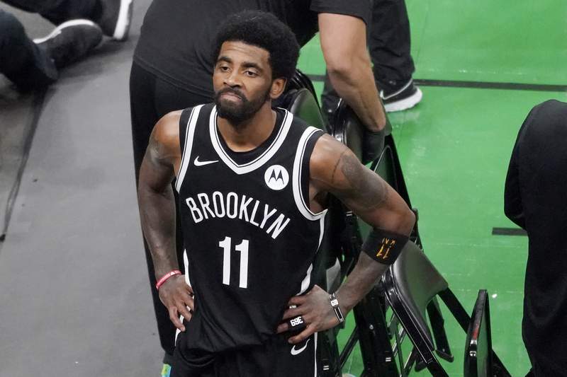Nets won't play Irving until he meets vaccine requirement
