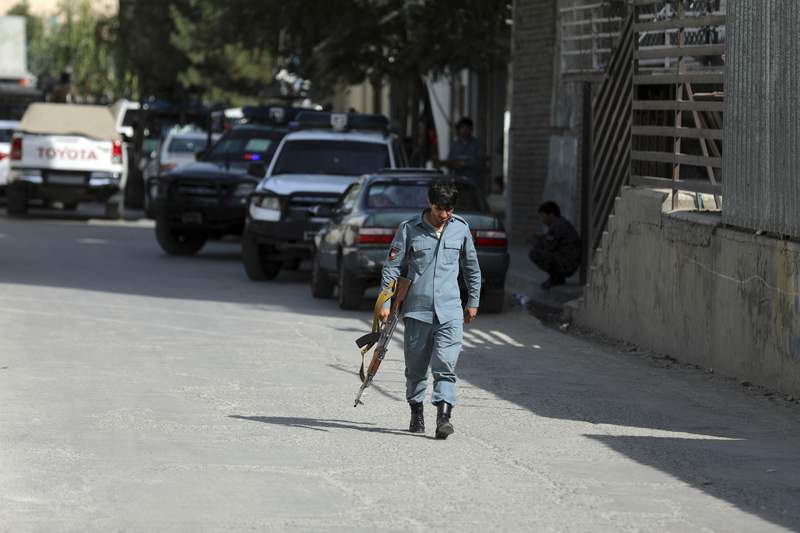 Taliban kill Afghan media chief in Kabul, take southern city