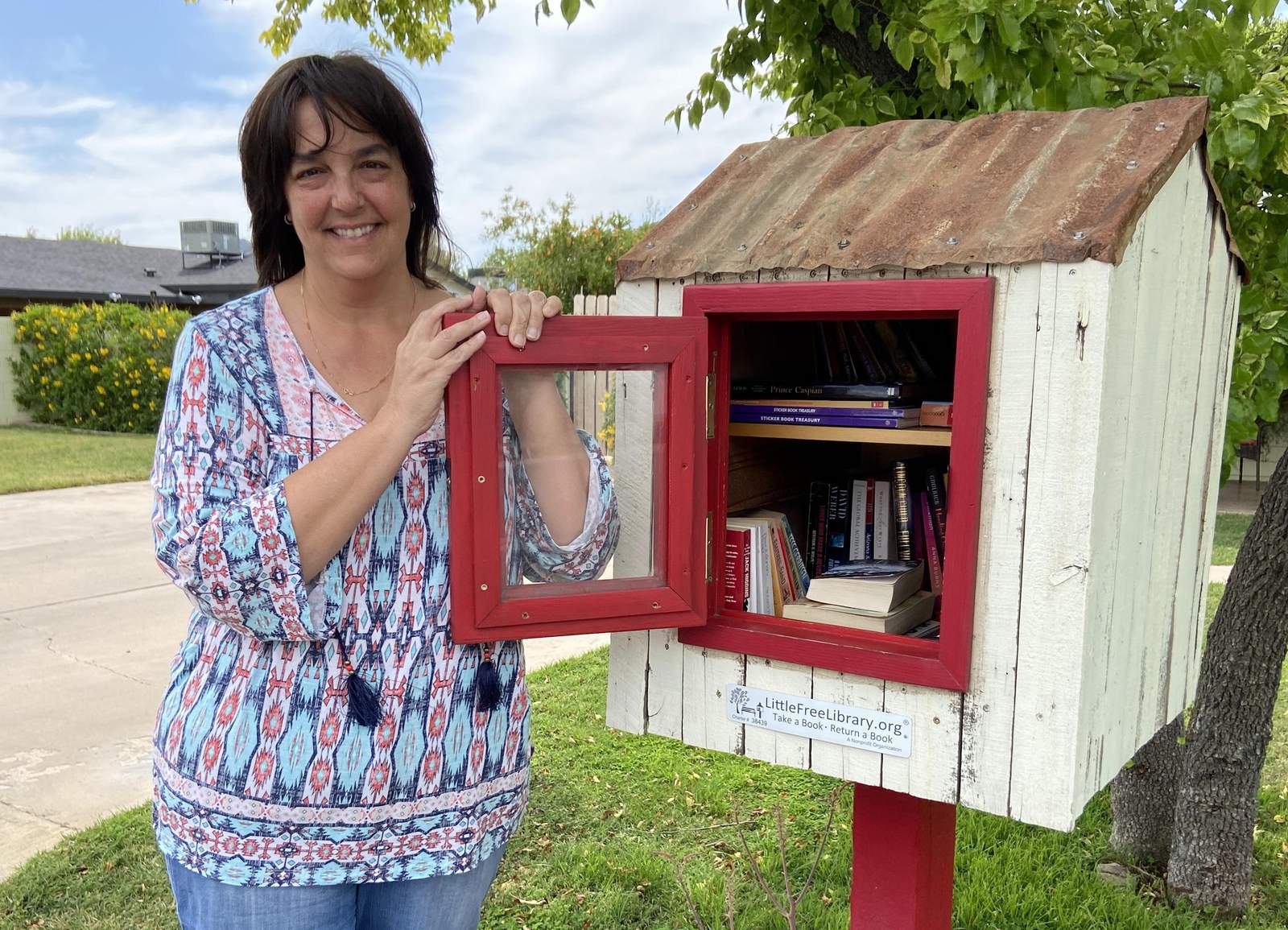 Small free libraries offering solace amid virus shutdowns