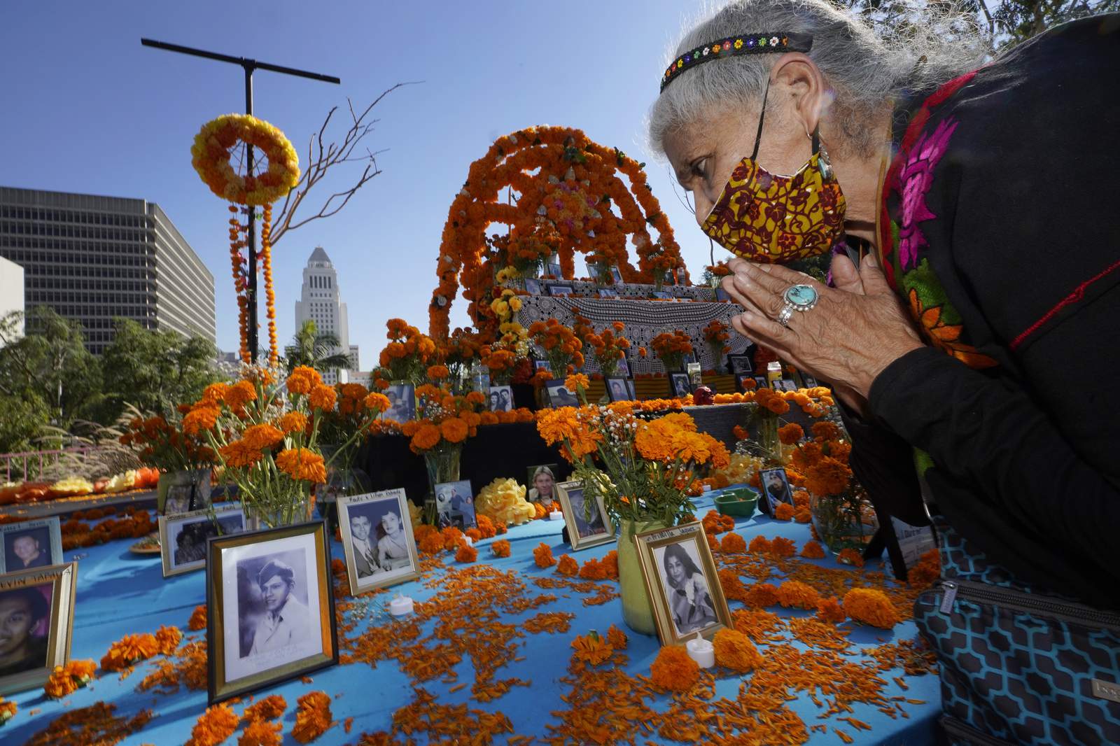 For many Latinos, virus deaths loom over Day of the Dead
