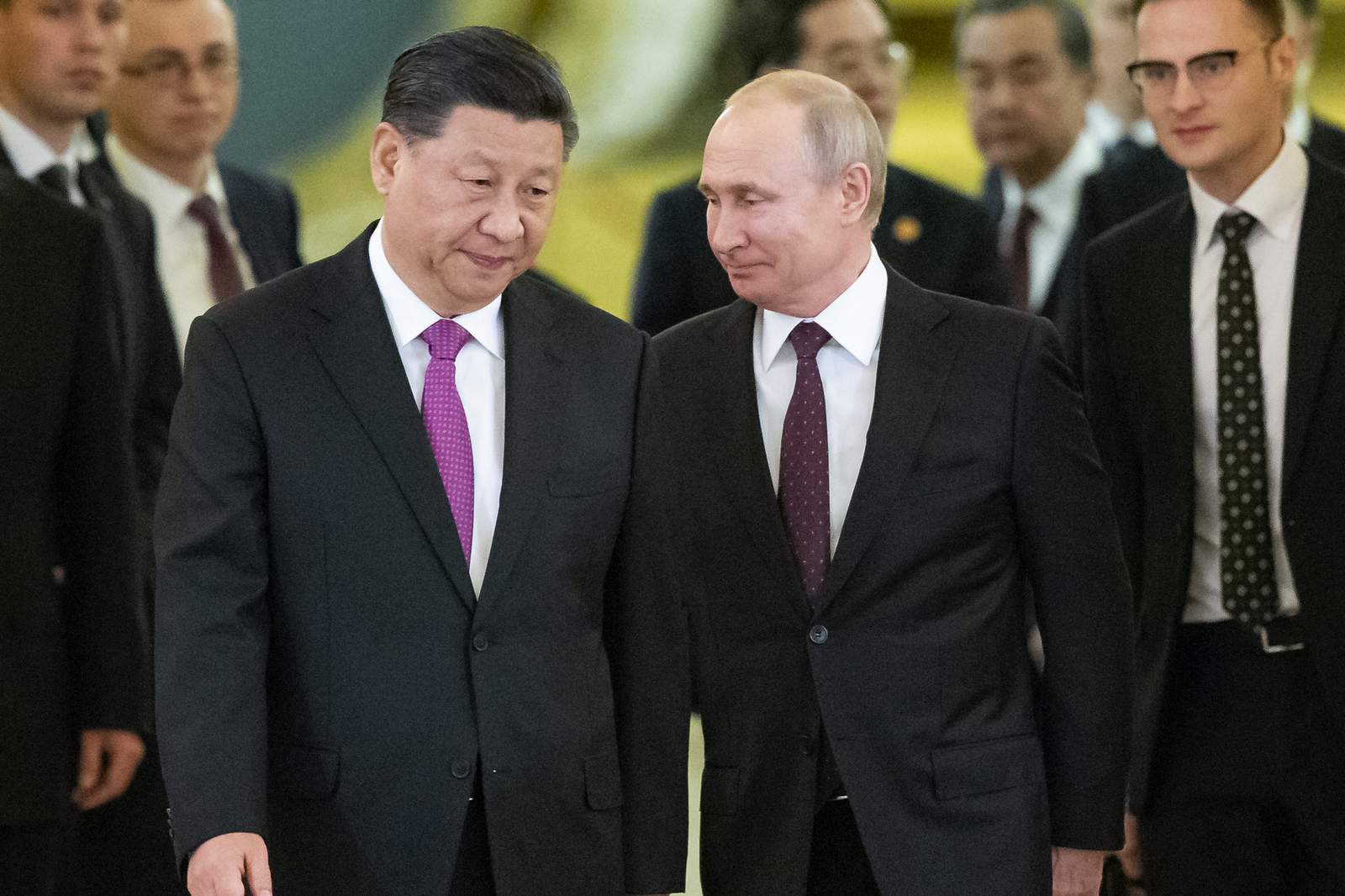 Leaders of Russia and China tighten their grips, grow closer