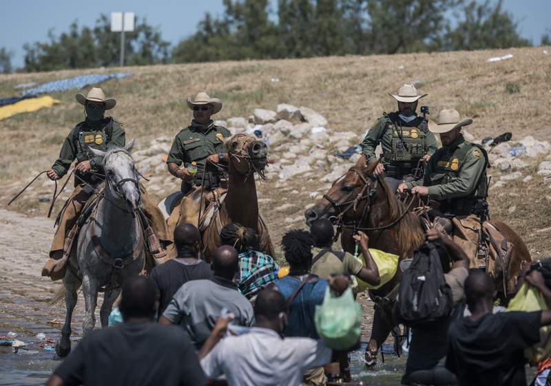 Homeland security secretary troubled by images of Border Patrol agents confronting migrants