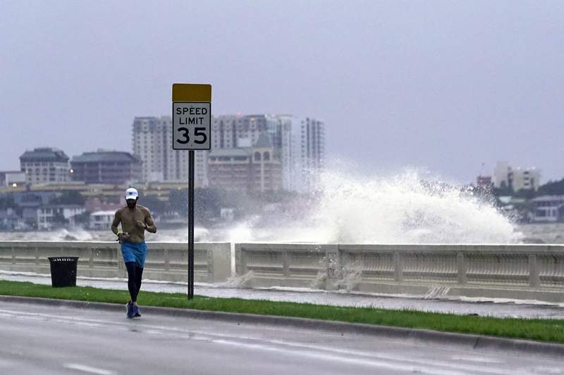 Tropical storm pounds East Coast after killing 1 in Florida