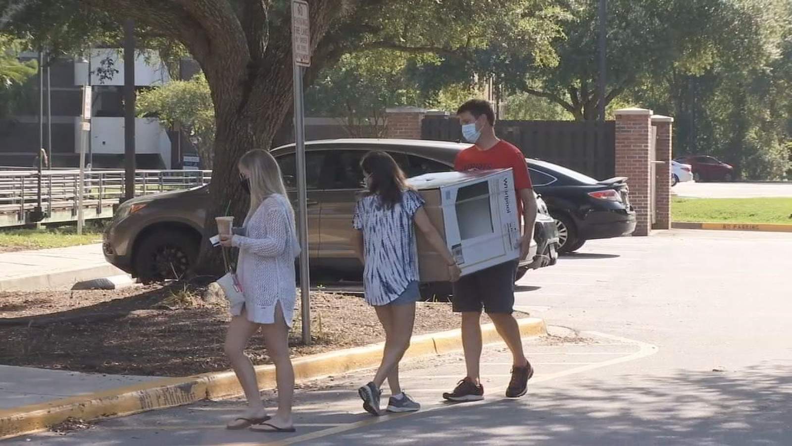 Pandemic protocols: College students under new process for move-in day
