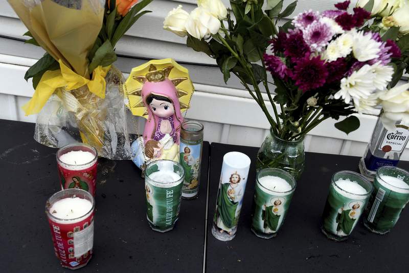 Colorado police seek motive in party shooting that killed 7