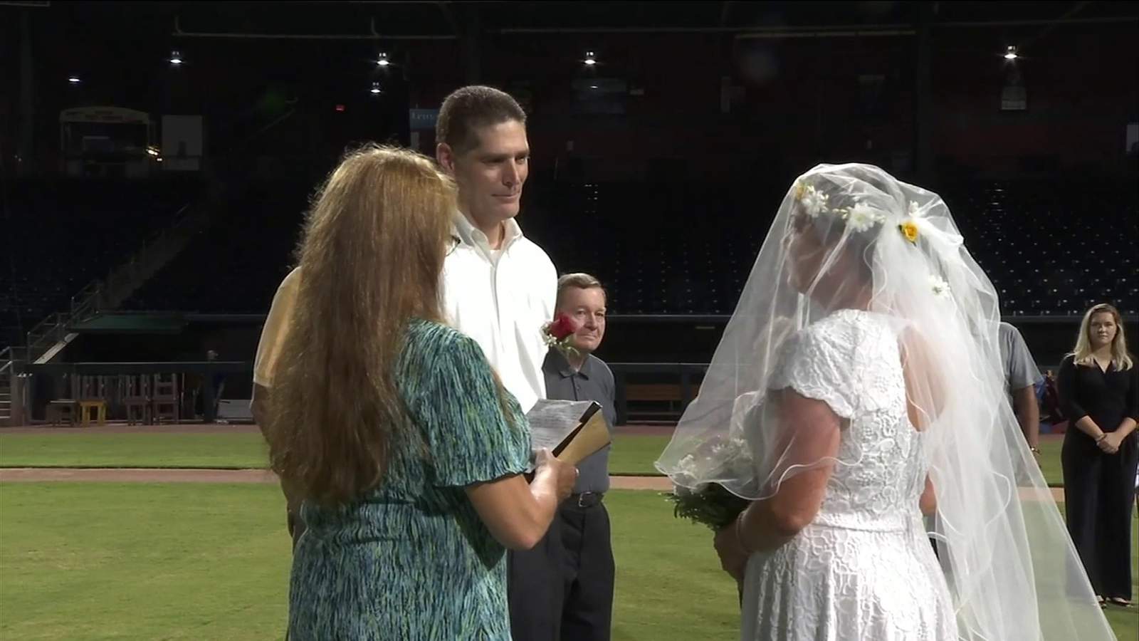 Couple gets hitched on field at Jacksonvilles baseball grounds