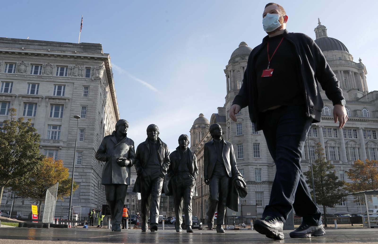 Virus curbs widen England's north-south rift, stir animosity