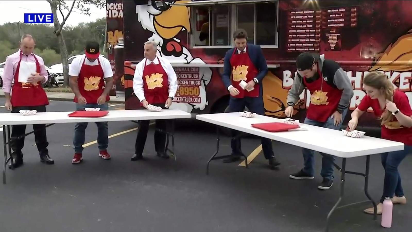 TMS crew and Bawk Bawk Chicken Truck hold spicy wing eating competition