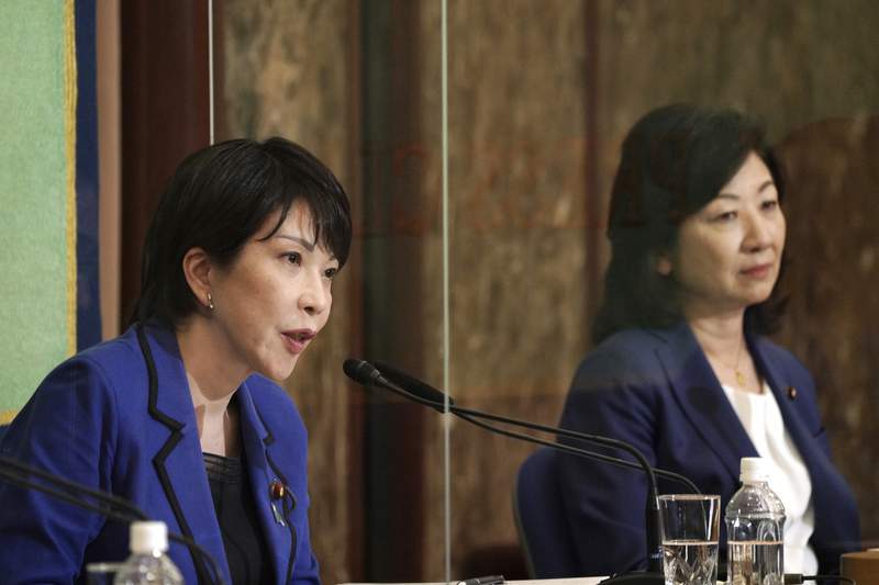 2 women in Japan party leadership race get mixed reactions