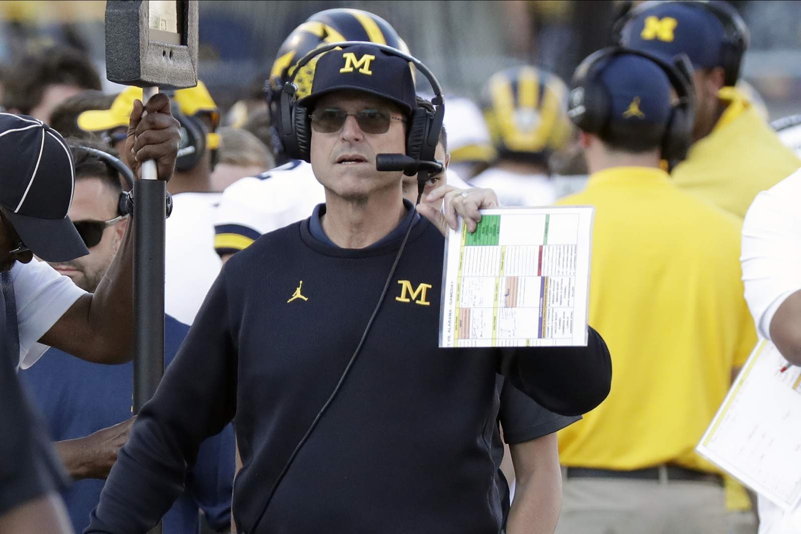 Michigan decides to stick with Jim Harbaugh with 5-year deal