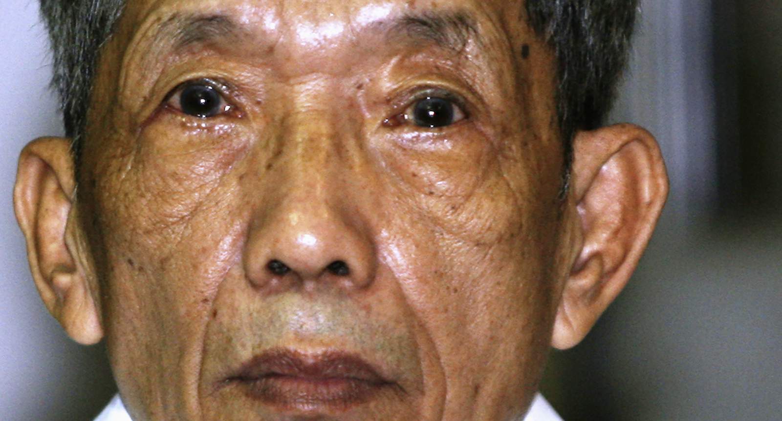 Khmer Rouges chief jailer, guilty of war crimes, dies at 77