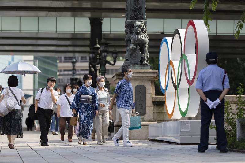 Olympic athlete, staffer test positive for virus in Tokyo