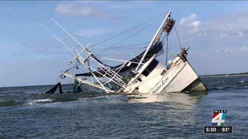 Following rescue, shrimp boat remains stranded off Fernandina Beach