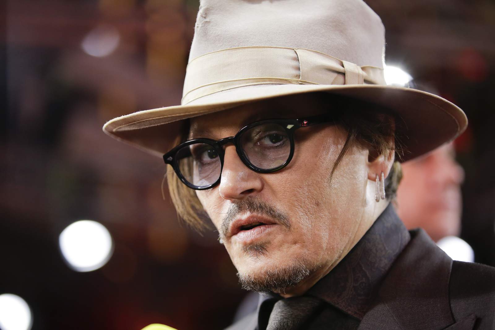 UK judge says Depp broke court order in Sun libel case