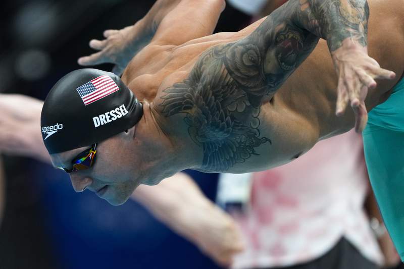 Make that 3: Caeleb Dressel sets world record in winning gold in 100 fly