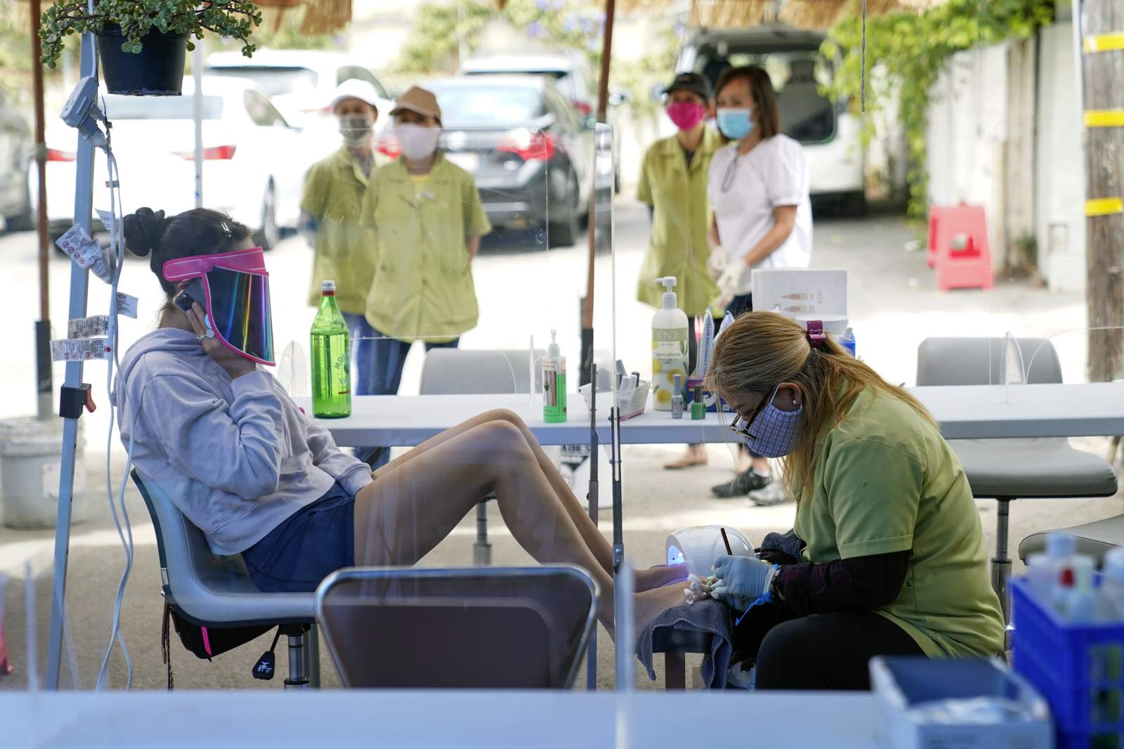 The Latest: Concerns over coronavirus upticks in California