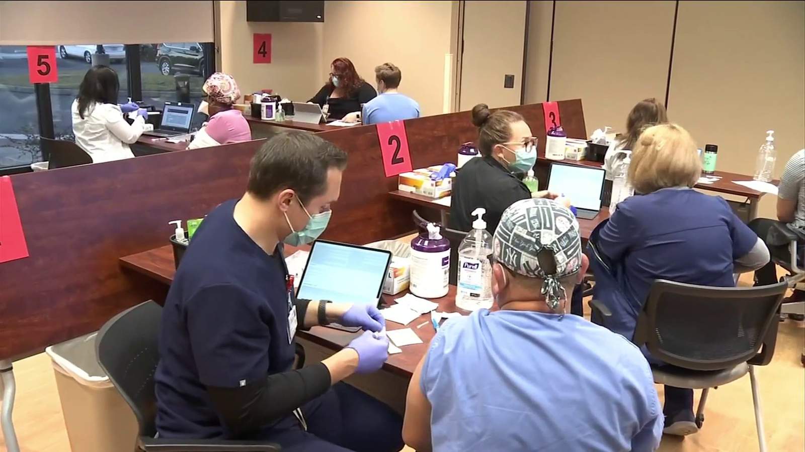 Health care workers, employees at Orange Park Medical Center get 2nd dose of COVID-19 vaccine