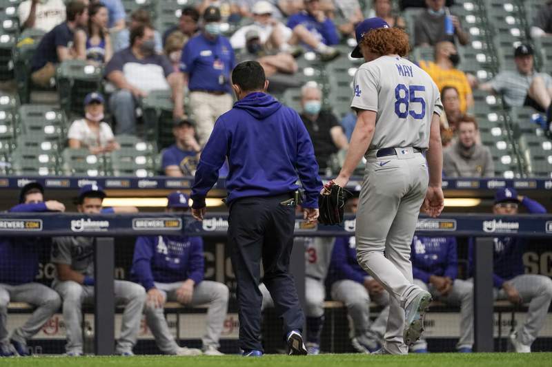 Dodgers' May put on injured list, latest setback for staff