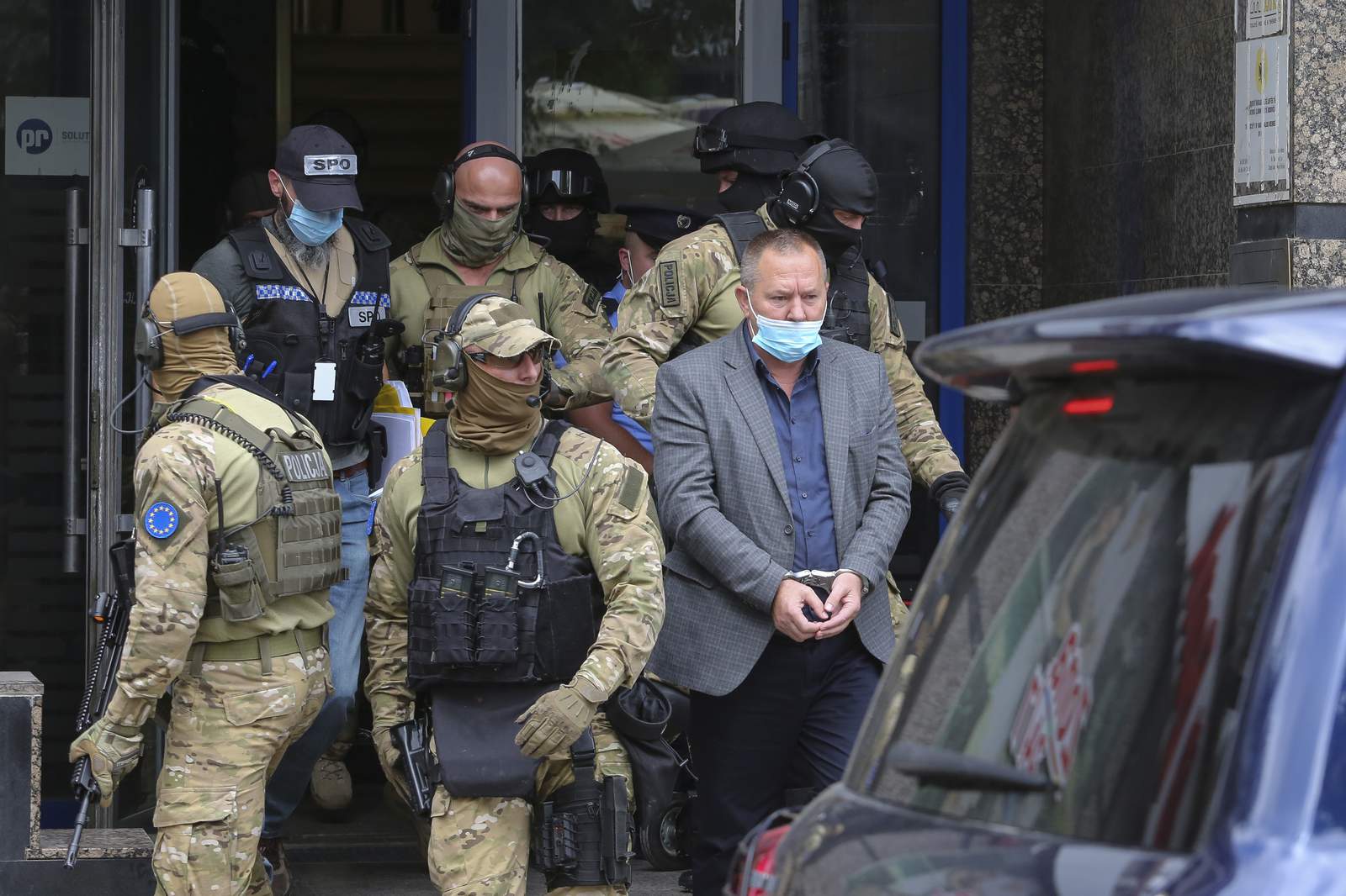 EU police arrest Kosovo war veterans' leader, raid offices