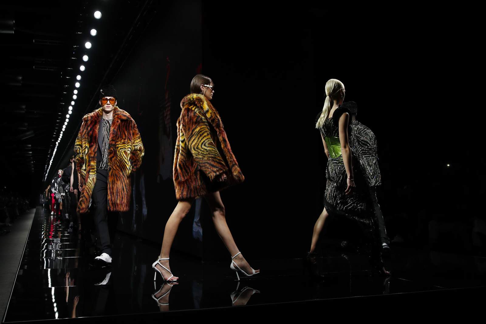 Milan fashion returning to runway in September - in part