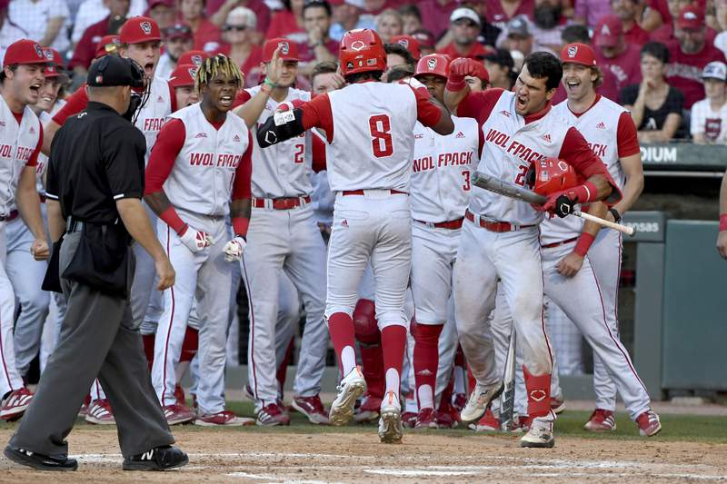 NC St, Tennessee lock up CWS bids; No. 1 seed Arkansas out