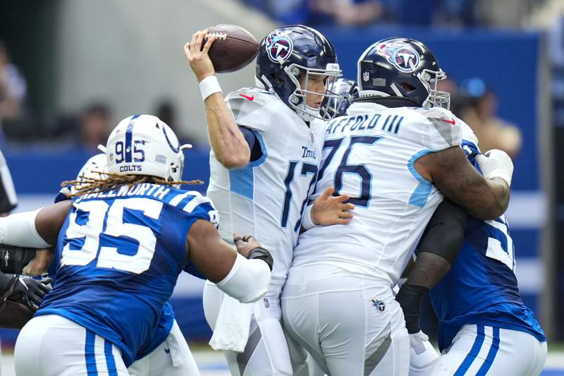 Titans use late turnovers to pull off 34-31 OT win at Indy