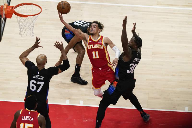 After spitting ordeal, Young leads Hawks past Knicks 105-94